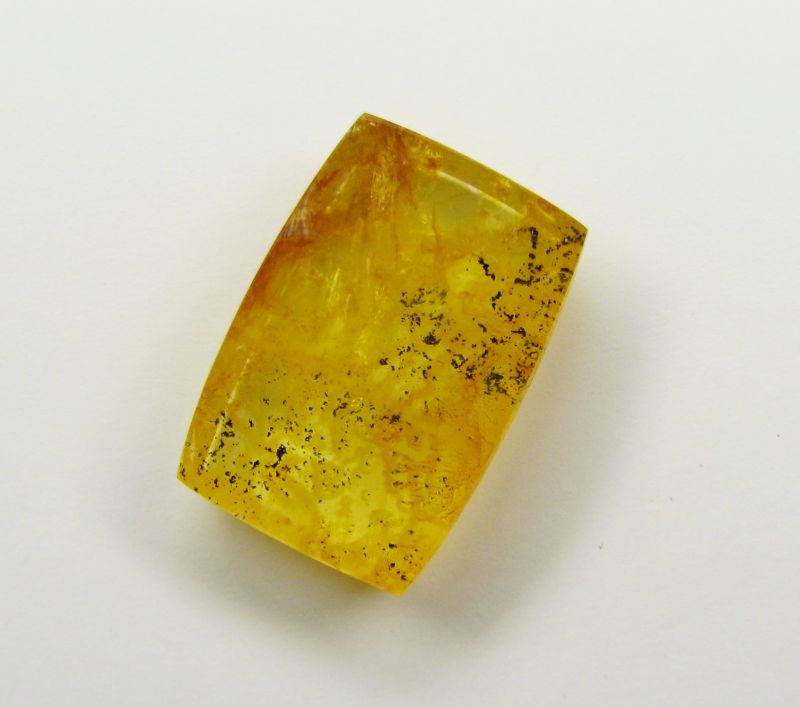 Фото Канареечный кварц (горный хрусталь) окрашен желтым лимонитом и коричневым гетитом 